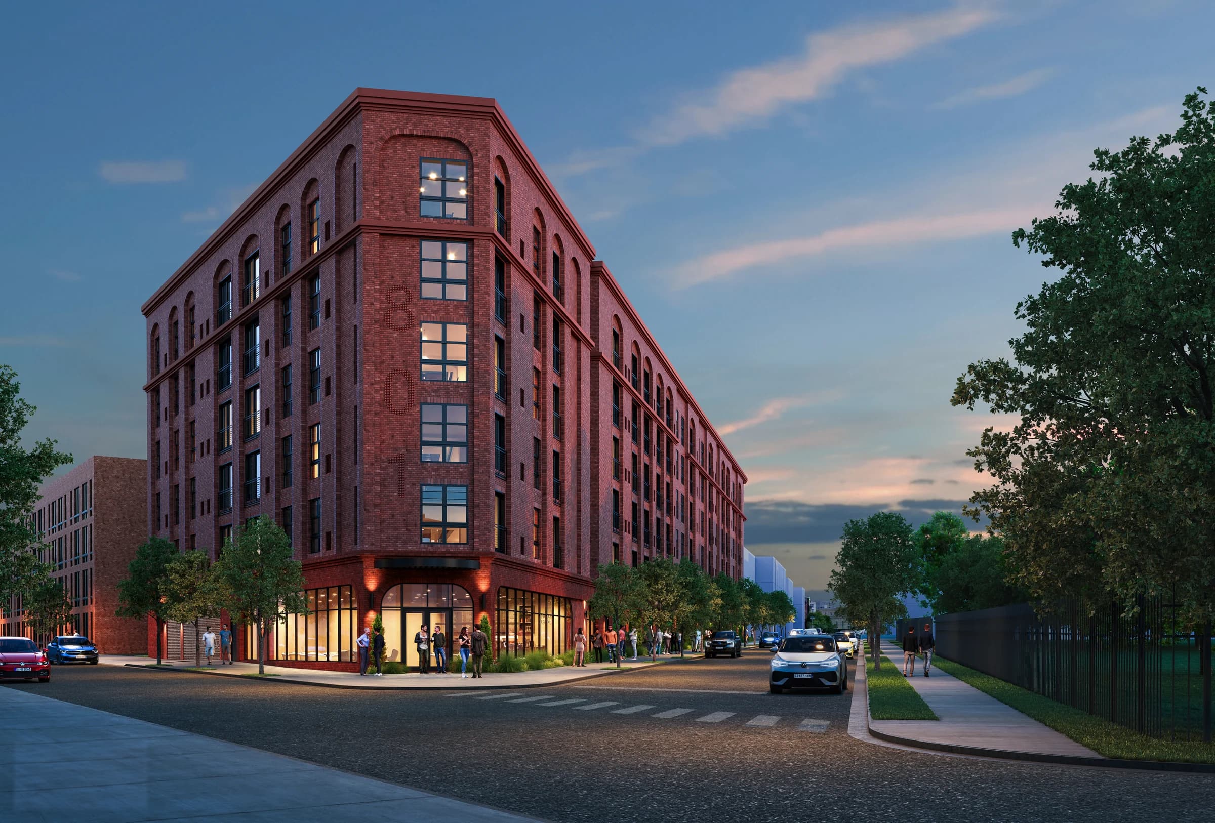 Cameron Square architectural rendering at dusk, with an illuminated corner entrance and brick street frontage